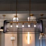 Люстра подвесная овальной формы с металлическим решетчатым абажуром матово-черного цвета и 5 лампами Kichler варинант исполнения - 7 | Loft Concept в Челябинске