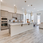 Подвесной светильник золотого цвета с двумя вытянутыми овальными рамками в форме скрепки Eurofase варинант исполнения - 7 | Loft Concept в Челябинске